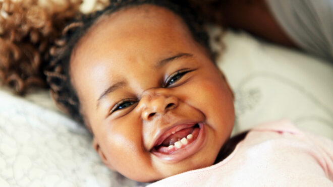 Cute African girl smiling at the camera