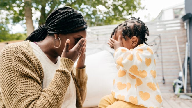 mom toddler playing peekaboo