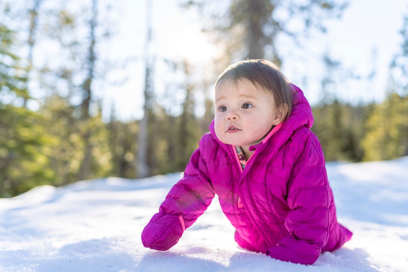 Baby wearing a snow suit