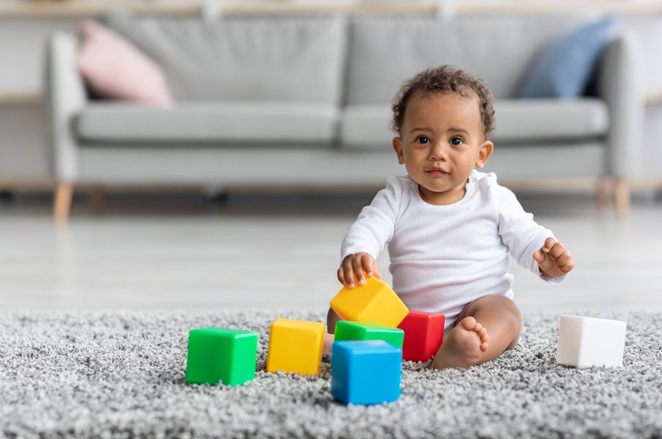 Baby playing with blocks