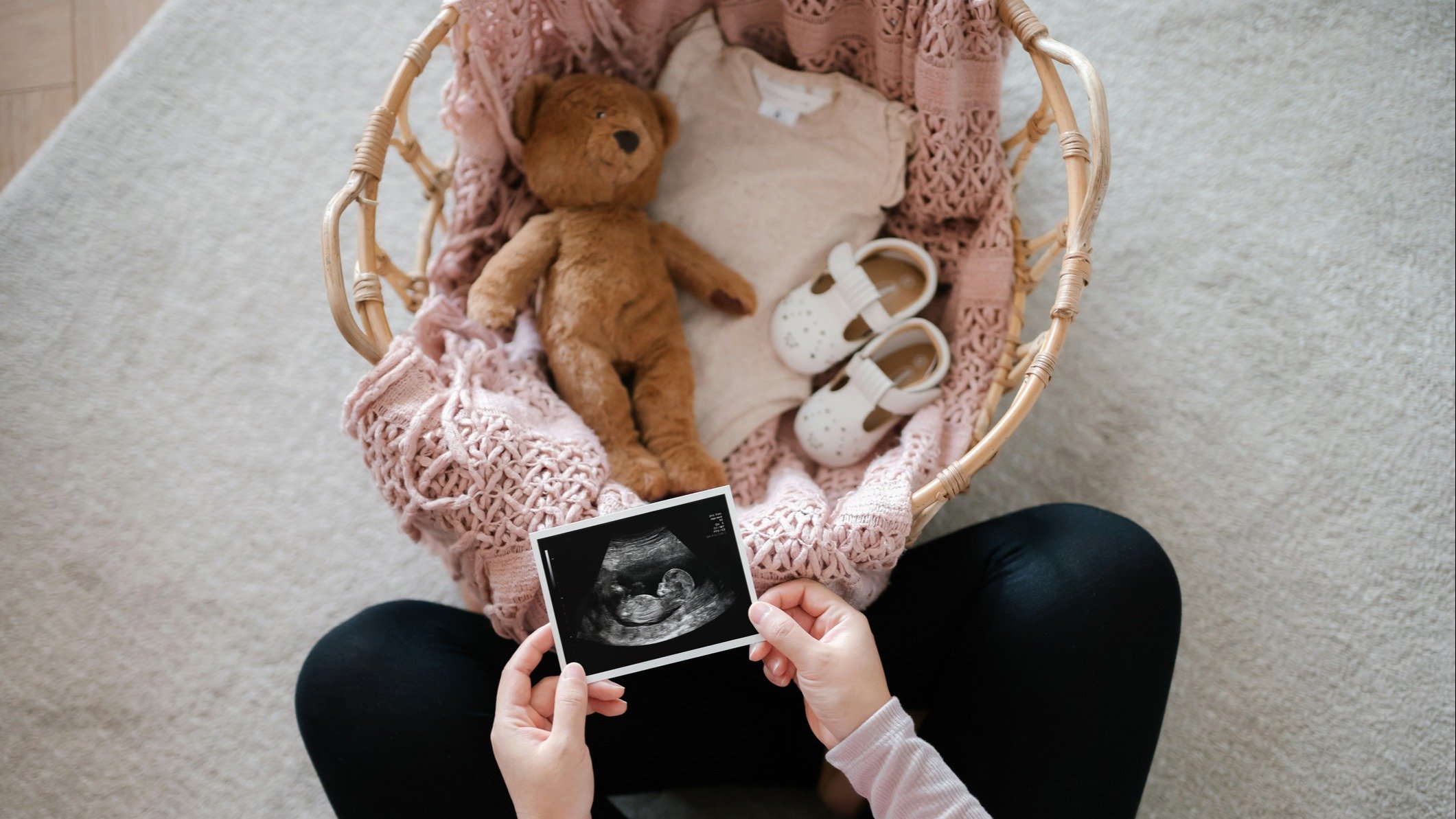 A woman looking at an ultrasound scan