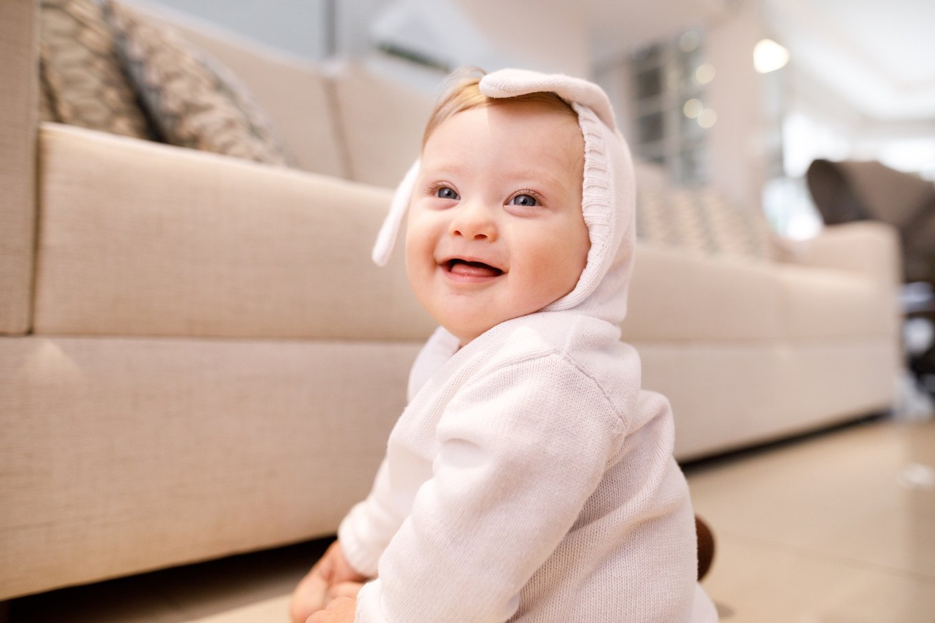 Baby in a white hoodie