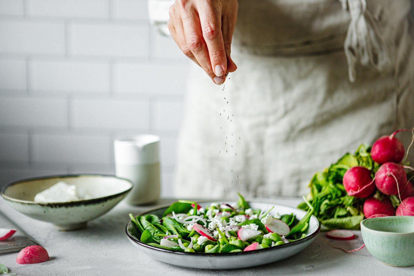 Person making a salad