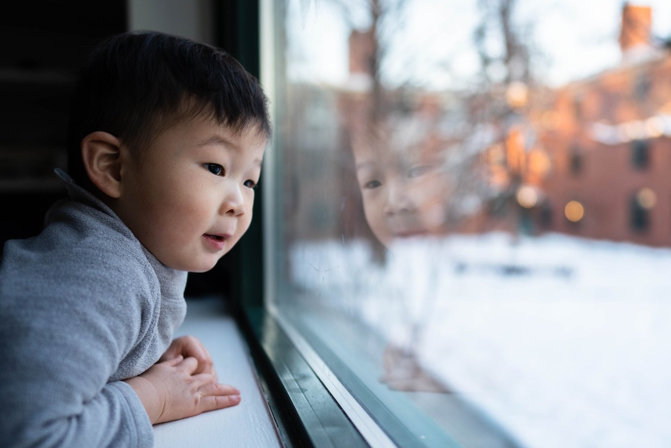 Boy looking out the window