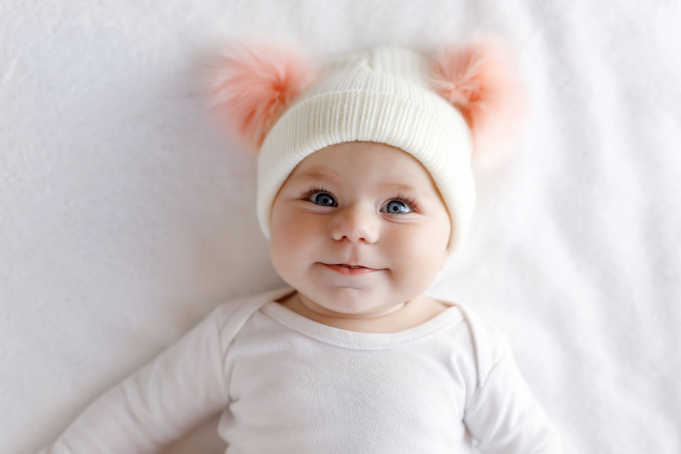 Baby girl in a fuzzy hat