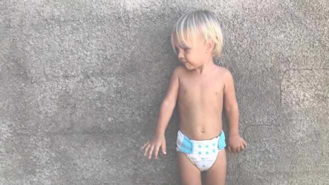 Little boy wearing pull-ups training pants