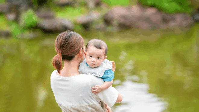 new mom holding baby
